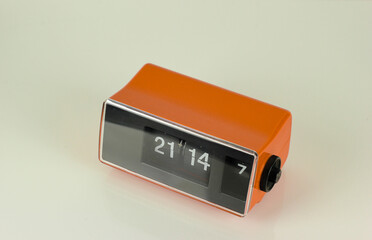 Vintage alarm clock from 70s orange design 