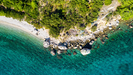 Croatia. Aerial view on beach and people. Vacation and relax. Beach and blue water. Top view from drone at beach and azure sea. Travel and holiday