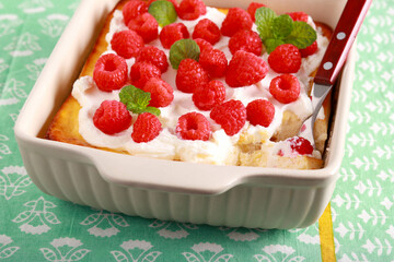 Sweet cheese pudding with sour cream and raspberry