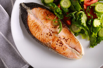  salmon steak with salad