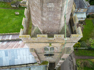 Drone aerial view of a typical English church showing the ornate features and leaded roof.
