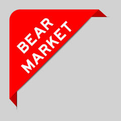 Red color of corner label banner with word bear market on gray background