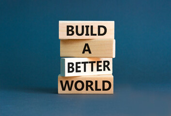 Build a better world symbol. Concept words Build a better world on wooden cubes. Beautiful grey table grey background. Business build a better world concept. Copy space.
