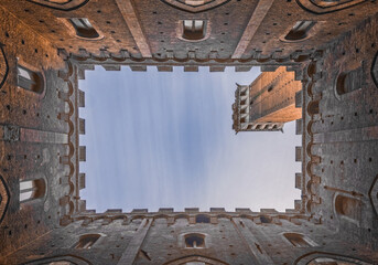 Siena, Italy, October 2022: geometric photo of palace in Siena in italy downtown rectangular shapes...