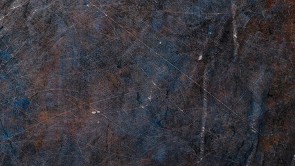 Dark abstract background scratched surface. Faded paint texture. Grunge surface vintage backdrop