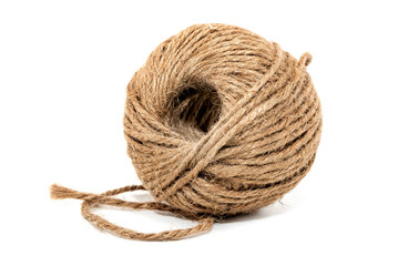 A ball of rope on a white background close-up. Harness. Jute. Twine isolate