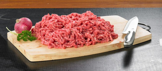 Raw Minced beef on a cutting board.
