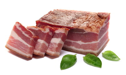 Dried and smoked bacon slice and basil leaves isolated on white  
