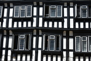 background of exterior vintage black and white  windows.vintage wooden windows