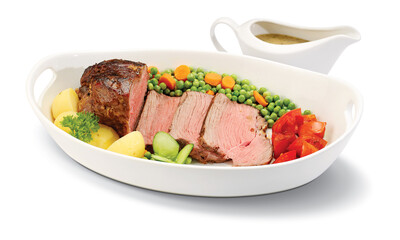 grilled beef steaks with spices on wooden cutting board