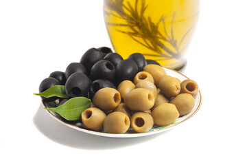 Jug with olive oil, green and black olives isolated on white background