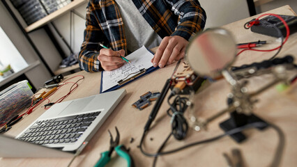 Partial IT engineer editing scheme with pencil