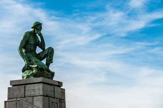 Charleroi, Belgium, November 11, 2022. The Crouching Miner located is a monument dedicated to Labor, designed by Constantin Meunier.