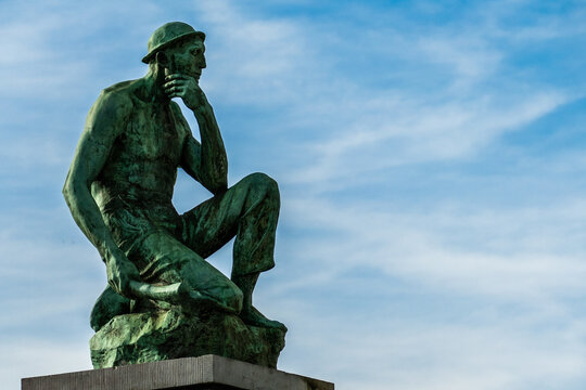Charleroi, Belgium, November 11, 2022. The Crouching Miner located is a monument dedicated to Labor, designed by Constantin Meunier.