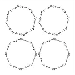 Set of 4 hand drawn spring wreaths isolated on white background, vector. Outline and silhouette frames with leaves. Doodle style.Collection of floral monogram frames.