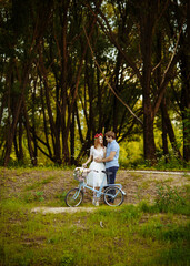 Loving couple on vintage bike