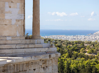Temple of Athena Nike and aerial view of the city and sea with port of Piraeus in the distance,...