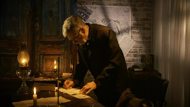 Victorian detective writing and looking at paperwork