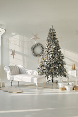Christmas living room with a christmas tree and presents under it - modern classic style. Luxury clean bright white interior. A spacious room with sunlight.
