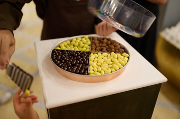 Sampling candies at an Italian candy shop