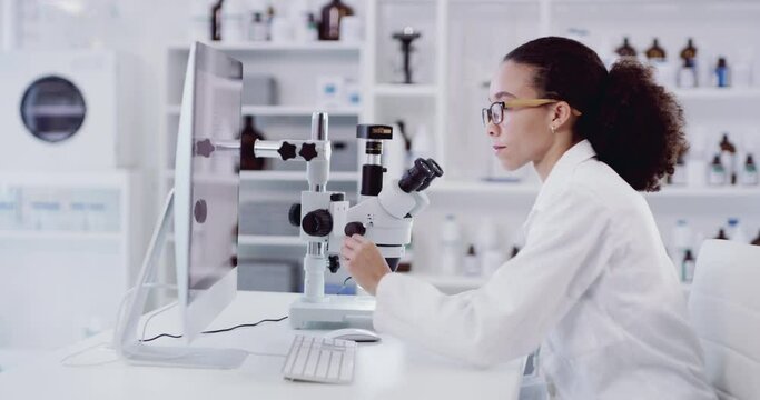 Science, doctor or scientist woman with microscope and computer for vaccine analytics, data analysis or medicine research in lab. Healthcare, innovation or nurse working on DNA, medical exam or tech