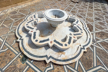 Marble fountain on the floor at the Mausoleum of Mohammed V in Rabat