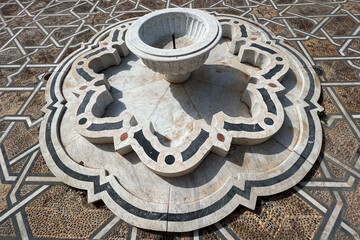 Marble fountain on the floor at the Mausoleum of Mohammed V in Rabat