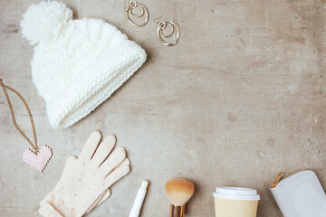 winter flat lay with hat, gloves and coffee cup