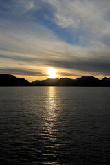 Naklejka na ściany i meble Sonnenuntergang an der Küste von Alta in Norwegen