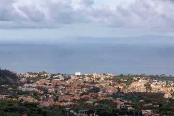 Fototapeta na wymiar Aerial View of Touristic Town, Sorrento, Italy. Coast of Tyrrhenian Sea. Cloudy Sky