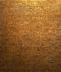 Old Egyptian hieroglyphs on an ancient background. Wide historical and culture background. Ancient...