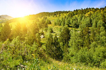 Mountain landscape in Andorra. Bright sunrise over the horizon.