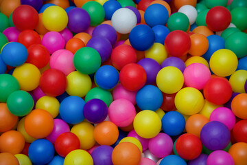 Fototapeta na wymiar kindergarten ball pool amusement center kid game childhood multicolored background