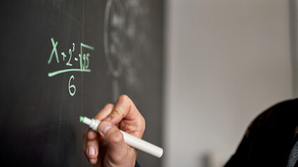 Math formula write blur cropped man on blackboard