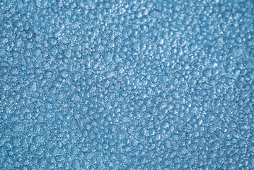 frosted water drops on the blue background