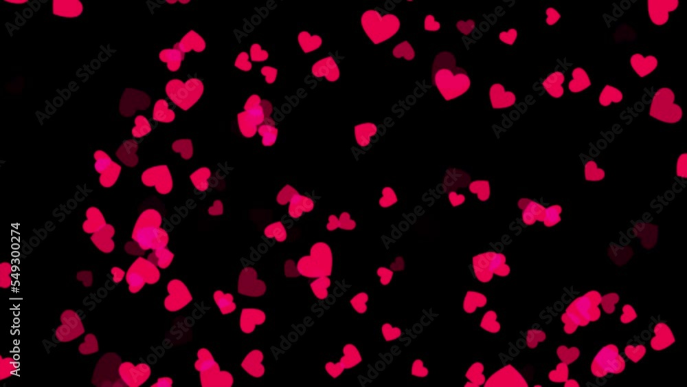 Poster red heart shape moving on black background. red heart particle animation on black background