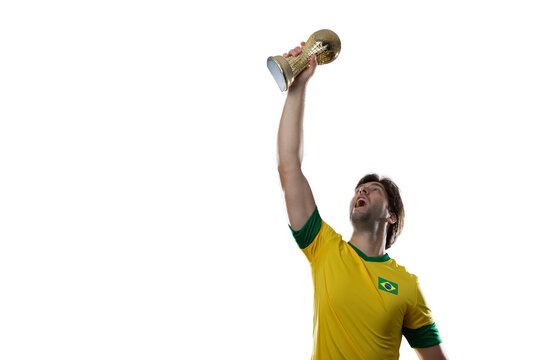 Brazilian soccer player, celebrating the championship with a trophy in his hand