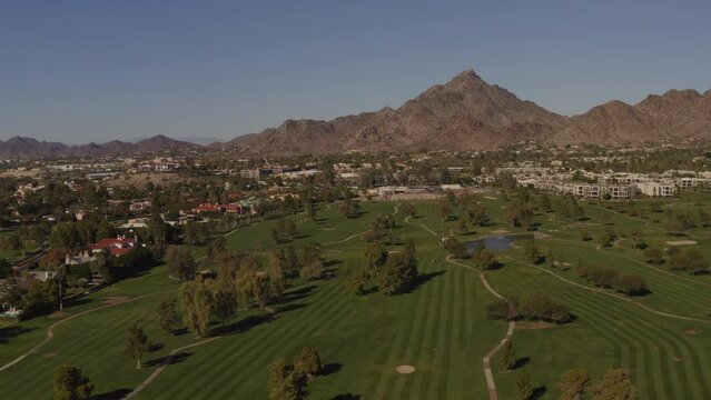 An aerial view of a golf corse in the American south west.
