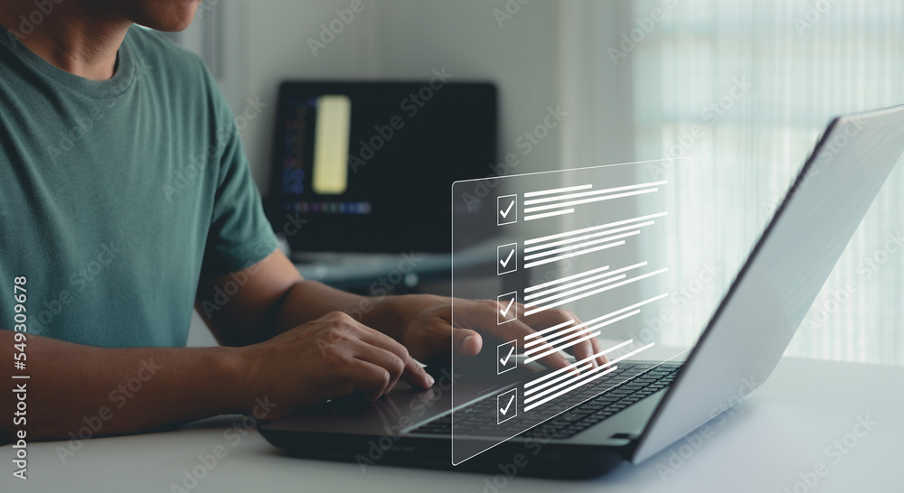 Poster iso certification document management system quality assurance. businessman working with a laptop co