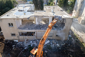 Demolition of a building for new construction.