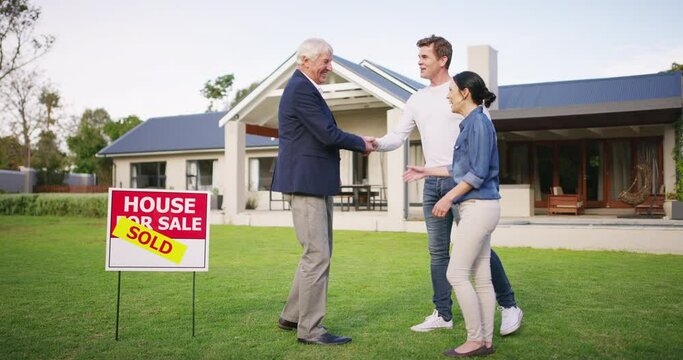 Real estate agent, couple and property with handshake, sold signage or thank you for house sale and invest on grass outdoor. Senior realtor, husband or wife shaking hands, b2b and welcome to new home