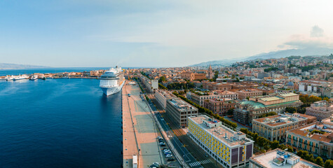 Messina, Sicily, Italy, August 20, 2022. View of the Messina's port with the gold Madonna della...