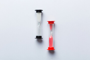 hourglass on the table, sand clock as time passing concept for business deadline, copy space