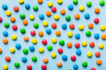 colorful candies as background top view. Seamless pattern with candy. Many sweet candies close-up