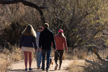 Obraz premium Hikers on Rio Grande Trail in Albuquerque New Mexico