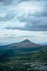 mountain in Sweden at summer time with cloud in the sky