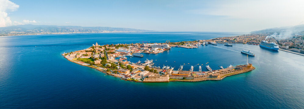 Messina, Sicily, Italy, August 20, 2022. View of the Messina's port with the gold Madonna della Lettera statue