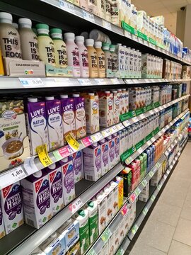 Kiel, Germany - 25.November 2022: View of a supermarket shelf in a German supermarket with numerous branded products.