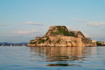 View from the sea of Corfu island and Sideros lighthouse.