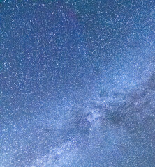 The galactic cloud of the Milky Way stretching across the sky and the stars of the universe.
